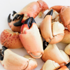 stone crab claws on butcher paper